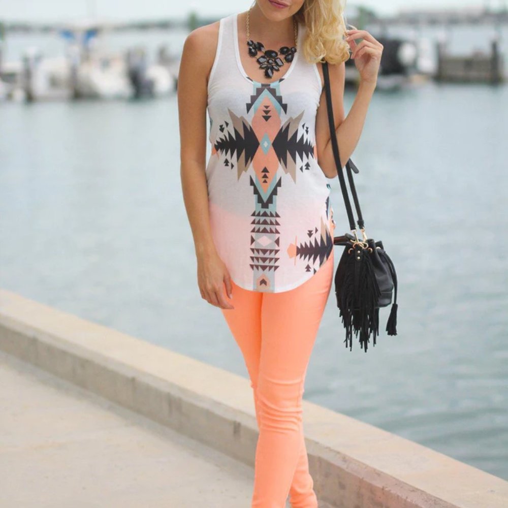 Sold NEON PEACH SKINNY JEANS